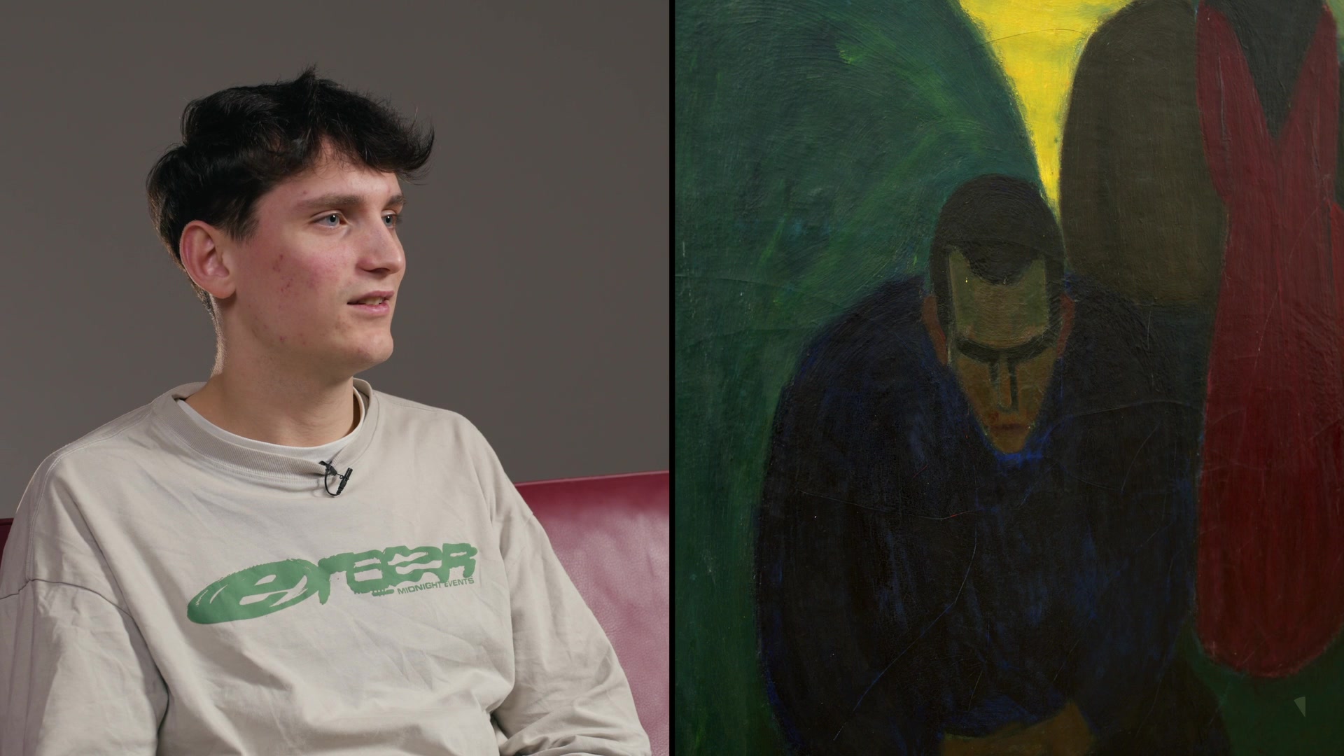 A young participant next to a painting