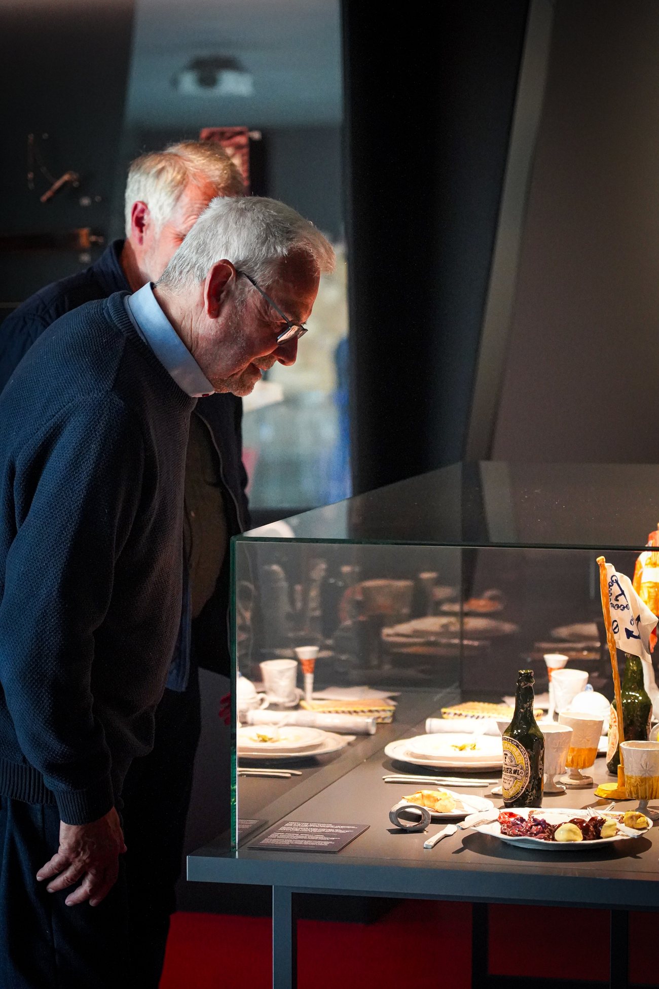 Guests looking at a dinner table from a ship