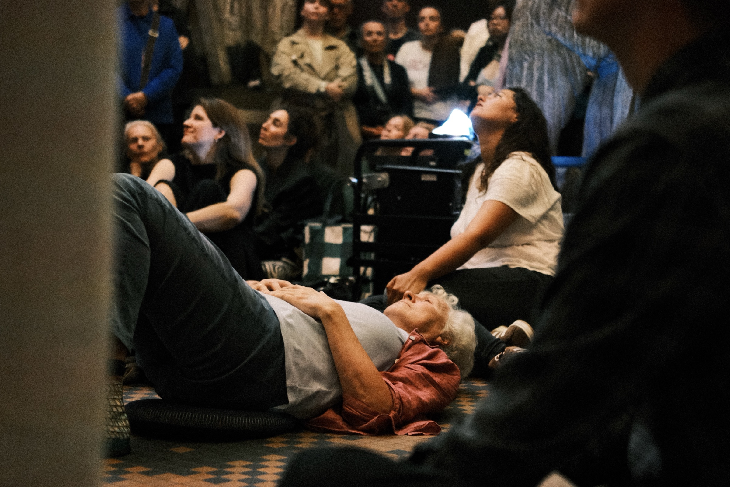Guests lying on the floor looking up
